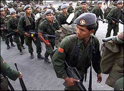 Indonesian soldiers leaving East Timor on 24 September, 1999