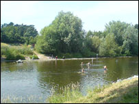 People swimming in the river at Usk 
