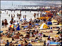 Crowded beach in heatwave