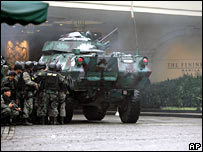 Army tank outside the Peninsula Hotel in Manila on 29 November 2007