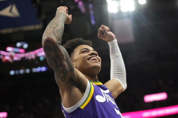 Utah Jazz guard Keyonte George reacts after the team's victory over the New Orleans Pelicans in an NBA basketball game, Monday, Nov. 27, 2023, in Salt Lake City. (AP Photo/Rick Bowmer)