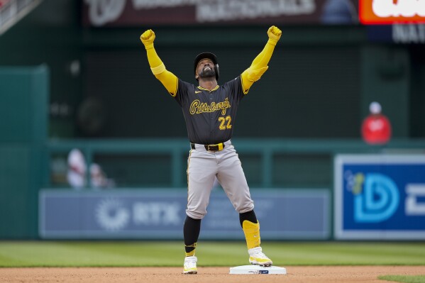 Pittsburgh Pirates designated hitter Andrew McCutchen celebrates his double during the seventh inning of an opening-day baseball game against the Washington Nationals at Nationals Park, Monday, April 1, 2024, in Washington. (AP Photo/Alex Brandon)