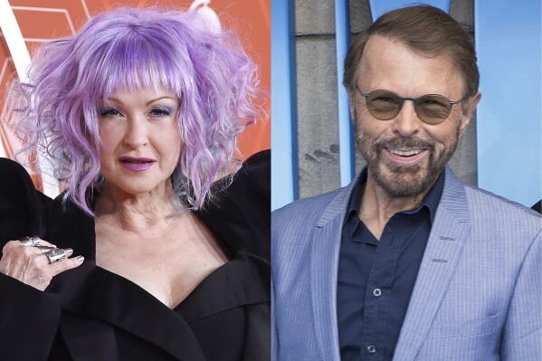 Cyndi Lauper arrives at the 74th annual Tony Awards in New York on Sept. 26, 2021, left, and Bjorn Ulvaeus appears at the premiere of "Mamma Mia! Here We Go Again" in London on July 16, 2018. (AP Photo)