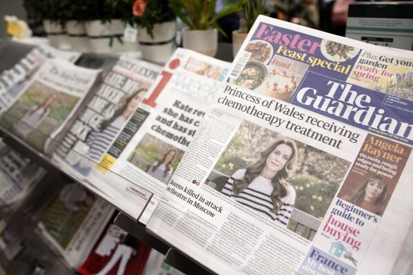 Newspaper front-pages are seen at a newsagent in London, Saturday, March 23, 2024. Britain's Kate, Princess of Wales's revelation she is undergoing treatment for cancer has sparked an outpouring of support and well wishes from around the world. (AP Photo/David Cliff)