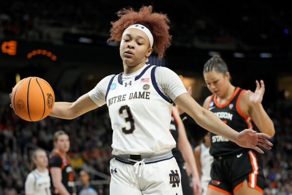 Notre Dame guard Hannah Hidalgo (3) reacts during the third quarter of a Sweet Sixteen round college basketball game against the Oregon State during the NCAA Tournament, Friday, March 29, 2024, in Albany, N.Y. (AP Photo/Mary Altaffer)