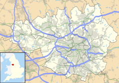 Mapa konturowa Wielkiego Manchesteru, blisko centrum na prawo znajduje się punkt z opisem „City of Manchester Stadium”