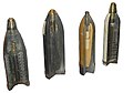 Shells of WWI. From left to right: 90 mm fragmentation shell, 120 mm pig iron incendiary shell 77/14 model, 75 mm high explosive shell model 16, 75 mm fragmentation shell