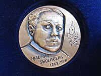 Hjalmar Söderberg, åtsidan och frånsidan av medalj i serien "Stora Svenska Författare" utformad 1978 av Berndt Helleberg.