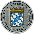 Frühere (bis 2014) Zulassungsplakette der Landeshauptstadt München mit dem bayerischen Staatswappen