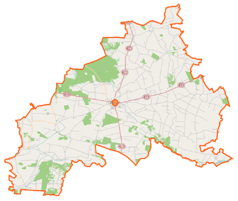 Mapa konturowa powiatu zwoleńskiego, po prawej znajduje się punkt z opisem „Pająków”
