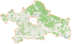 Mapa konturowa powiatu białostockiego, blisko centrum na dole znajduje się punkt z opisem „Zabłudów”
