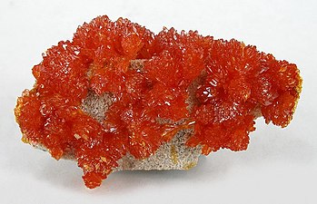 El mineral orpiment era una font de pigments grocs i taronja a l'antiga Roma, tot i que contenia arsènic i era altament tòxic