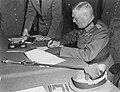 Field Marshall Wilhelm Keitel signing the unconditional surrender of the German Wehrmacht at the Soviet headquarters in Karlshorst, Berlin. 8 May 1945