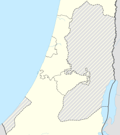 Mapa konturowa Dystryktu Centralnego, w centrum znajduje się punkt z opisem „Ramla”