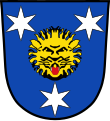 Markt Heroldsberg In Blau zwischen drei zwei zu eins gestellten, silbernen Sternen ein herschauender, rot gezungter goldener Löwenkopf.