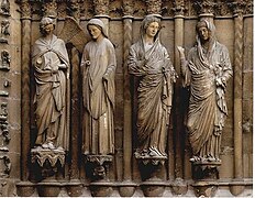 Западен портал на Катедрала в Реймс: Благовещение с усмихнатия ангел отляво (13 век)