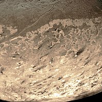 Dark streaks across Triton's south polar cap surface, thought to be dust deposits left by eruptions of nitrogen geysers.