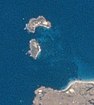 New Year Island (oben), darunter Christmas Island und die Nordwest­küste von King Island