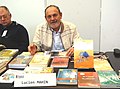 L'auteur wallophone à son stand, à l'occasion de la Foire du livre d'Étalle, en 2019.