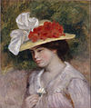 Un fem en un xapo con flores, par Renoir