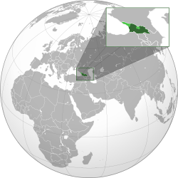 Georgia proper shown in dark green; areas outside of Georgian control but claimed as part of its sovereign territory shown in light green.