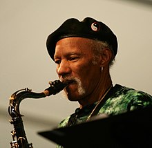 Neville playing sax at Jazz Fest, 2011