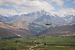 Black Hawk flying over a valley in Bamyan