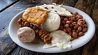 Bandeja paisa is a typical meal popular in Colombian cuisine. Paisa refers to the Paisa Region and bandeja is Spanish word for platter.