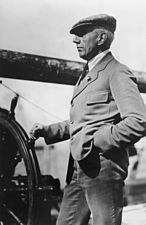 Captain Roald Amundsen at the wheel