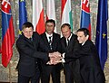 Zleva: Robert Fico, Jan Fischer, Donald Tusk, Gordon Bajnai (Krakov 2009)