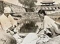 Women doing laundry at Hwahongmun shortly before the outbreak of the Korean War