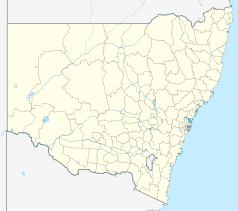 Mapa konturowa Nowej Południowej Walii, po prawej nieco na dole znajduje się punkt z opisem „Opera w Sydney”