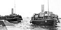 Auxiliary vessels Ireland (left) and America (right) carry passengers and luggage for the Titanic in Cobh
