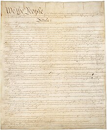 Image of handwritten copy of the Constitution.