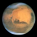A Mars a pólusoknál lévő jégsapkával. A déli-sarki jégsapka főként szárazjégből, azaz szén-dioxidból áll, ami a Mars légkörének is a fő összetevője. Az északi-sark egy jóval nagyobb terület, amit csak télen borít elsődlegesen vízjégből álló jég