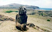 Tukuturi at Rano Raraku is the only kneeling moai and one of the few made of red scoria.