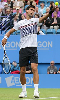 Novak Djokovic serving ball