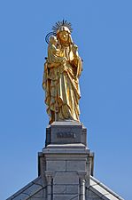 Statue of Saint-Anne (by Matthias Zens) on the outside of the Basilica of Sainte-Anne-de-Beaupré