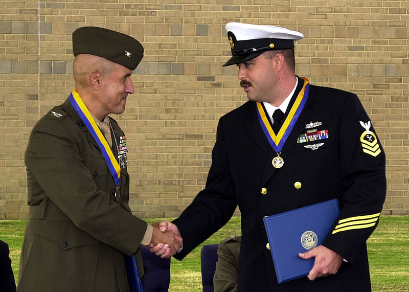 File:US Navy 061020-N-1082Z-003 Marine Corps Intelligence Training Center (NMITC) Executive Officer Col. Francis X. Cubillo congratulates Chief Intelligence Specialist Danny Leek after each were selected for the Rear Adm. Edwin T. L.jpg