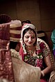 لبخند خجالتی یک عروس اهل هند در مراسم ازدواج