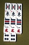 Mahjong med fyra pong och ett par