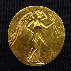 Nike on an ancient gold Greek coin.