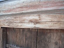 Dalekarlische Runeninschrift auf Holzhaus in Orsa, Haus jetzt in Mora, Schweden 1635