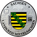 Aktuelle Zulassungsplakette des Landkreises Mittelsachsen mit dem sächsischen Landeswappen