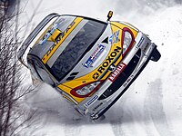 10: Peugeot 206 WRC tijekom Švedskog Relija 2003. g.