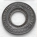 Anverso de moneda de 8 reales (plata) de Carlos III de 1773 agujereada en Australia (holey dollar).