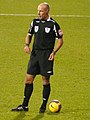 A referee with the ball.