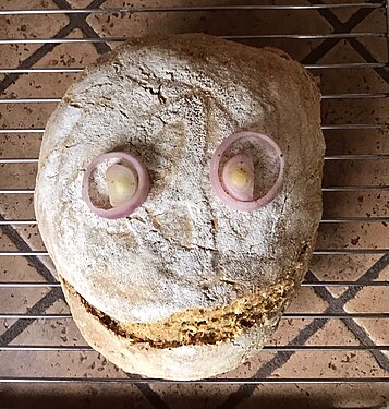 Fresh home-baked bread with a smile