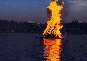 Midsummer Night bonfire on water