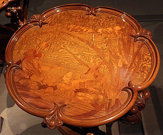Marquetry table top with damselfly[15] design (1900) (Fin de Siècle Museum, Brussels)